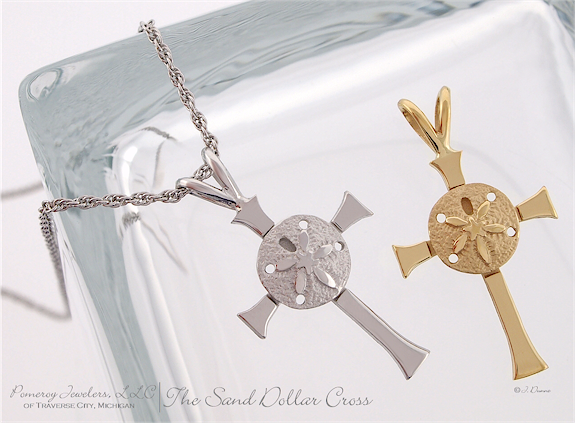 The Sand Dollar Cross is pictured here in sterling silver or 14k yellow gold. 