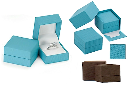 Choice of aqua or chocolate colored patterned leatherette boxes.